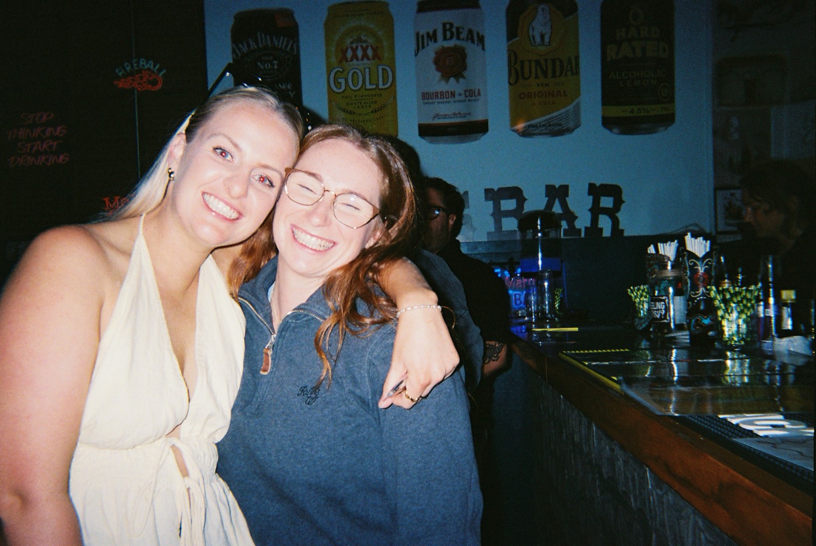 Two friends at the bar at Mary's Bar