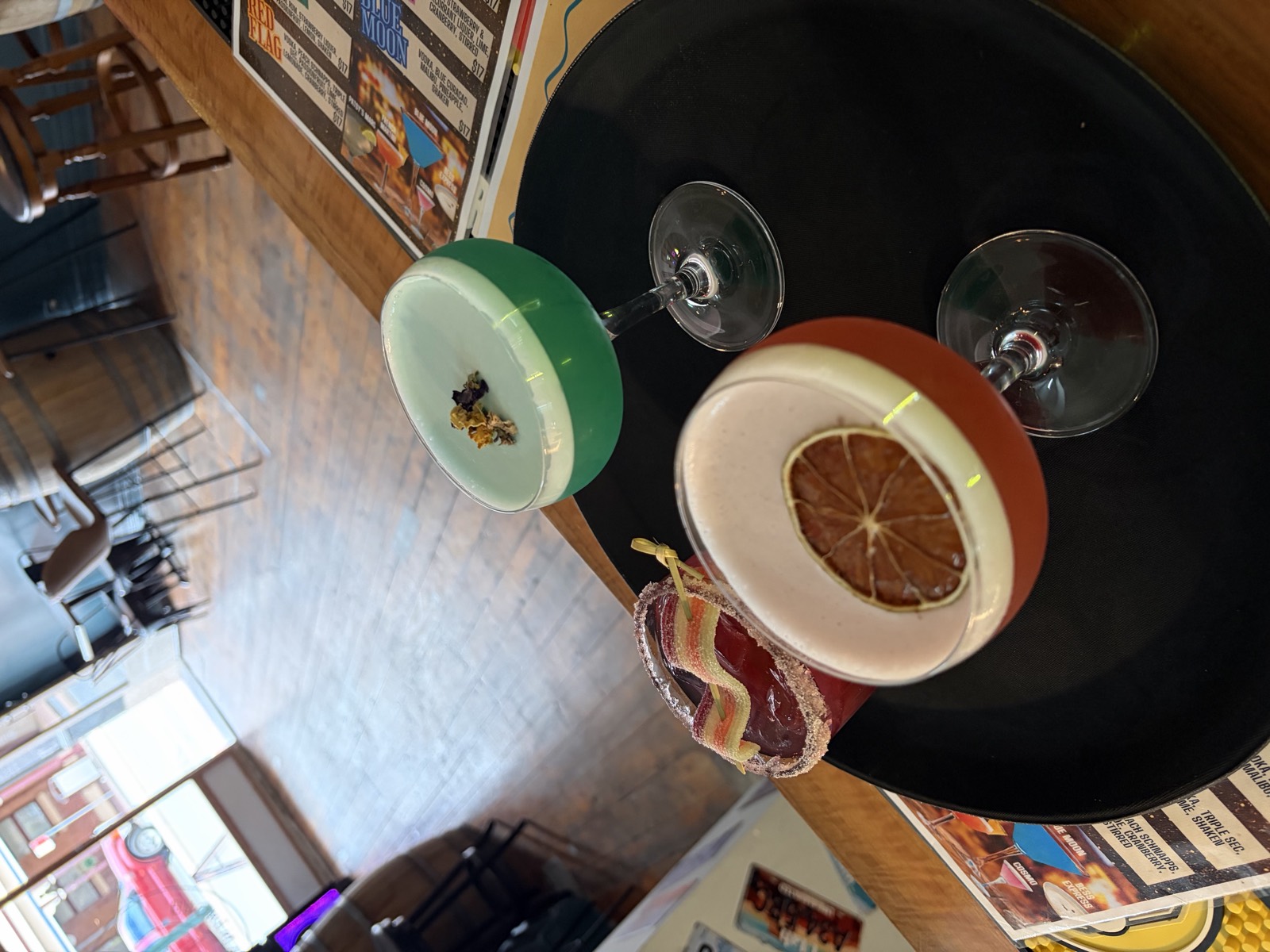 Two cocktails served on a tray at Mary's Bar