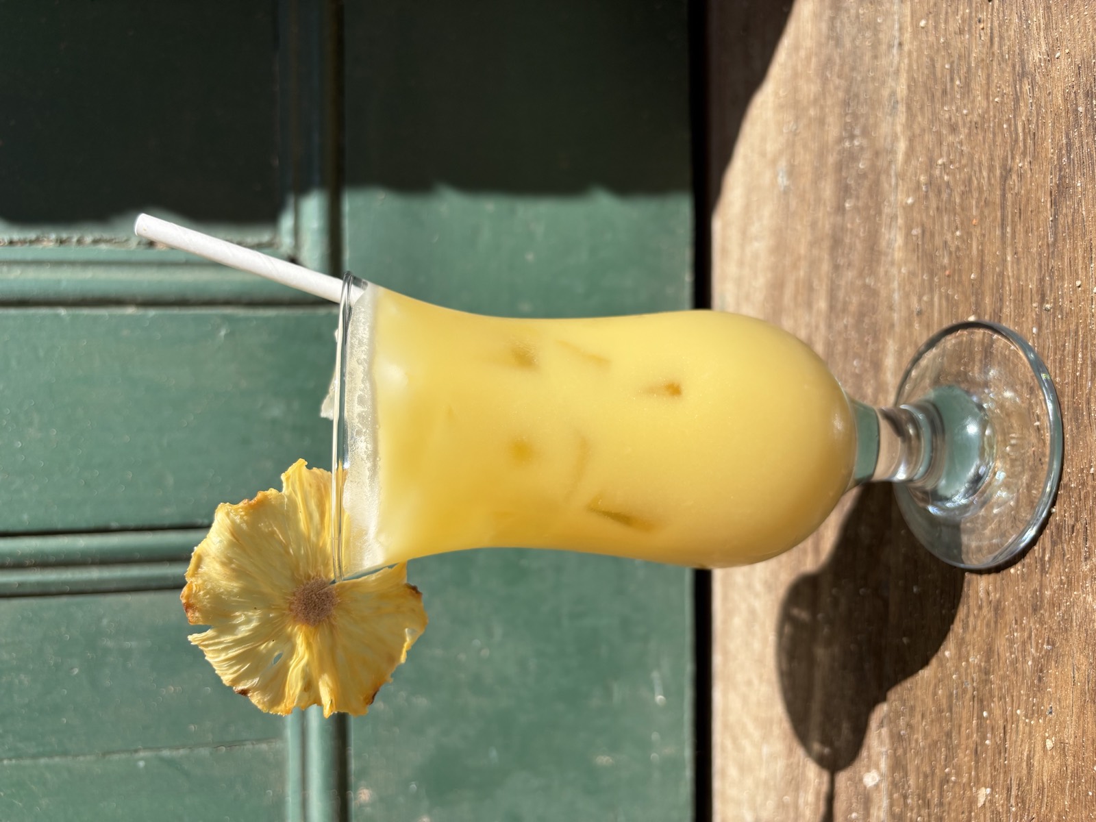 A pineapple cocktail in the afternoon sun